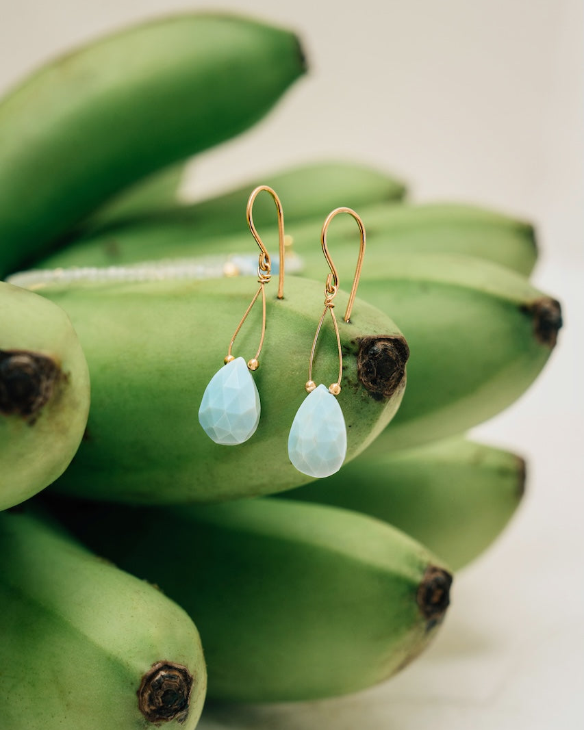 Beautiful drop earrings featuring a teardrop Blue Opal with 14k gold filled beads for a summery earring