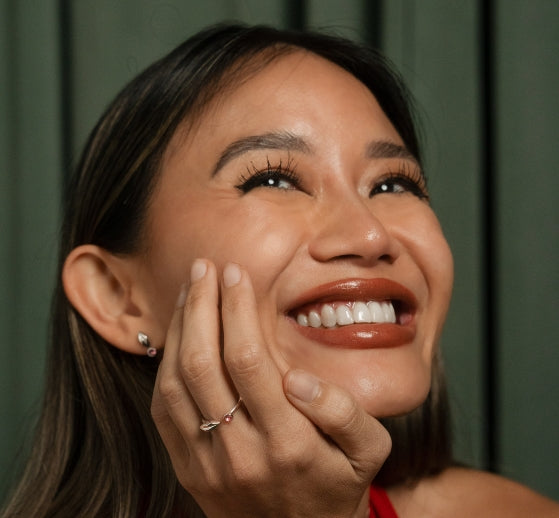 Model wearing our fun minimalist jewellery from Kiss & Tell collection