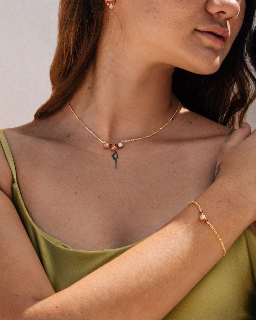 Minimalist golden moonstone and tourmaline bracelet perfect for everyday wear
