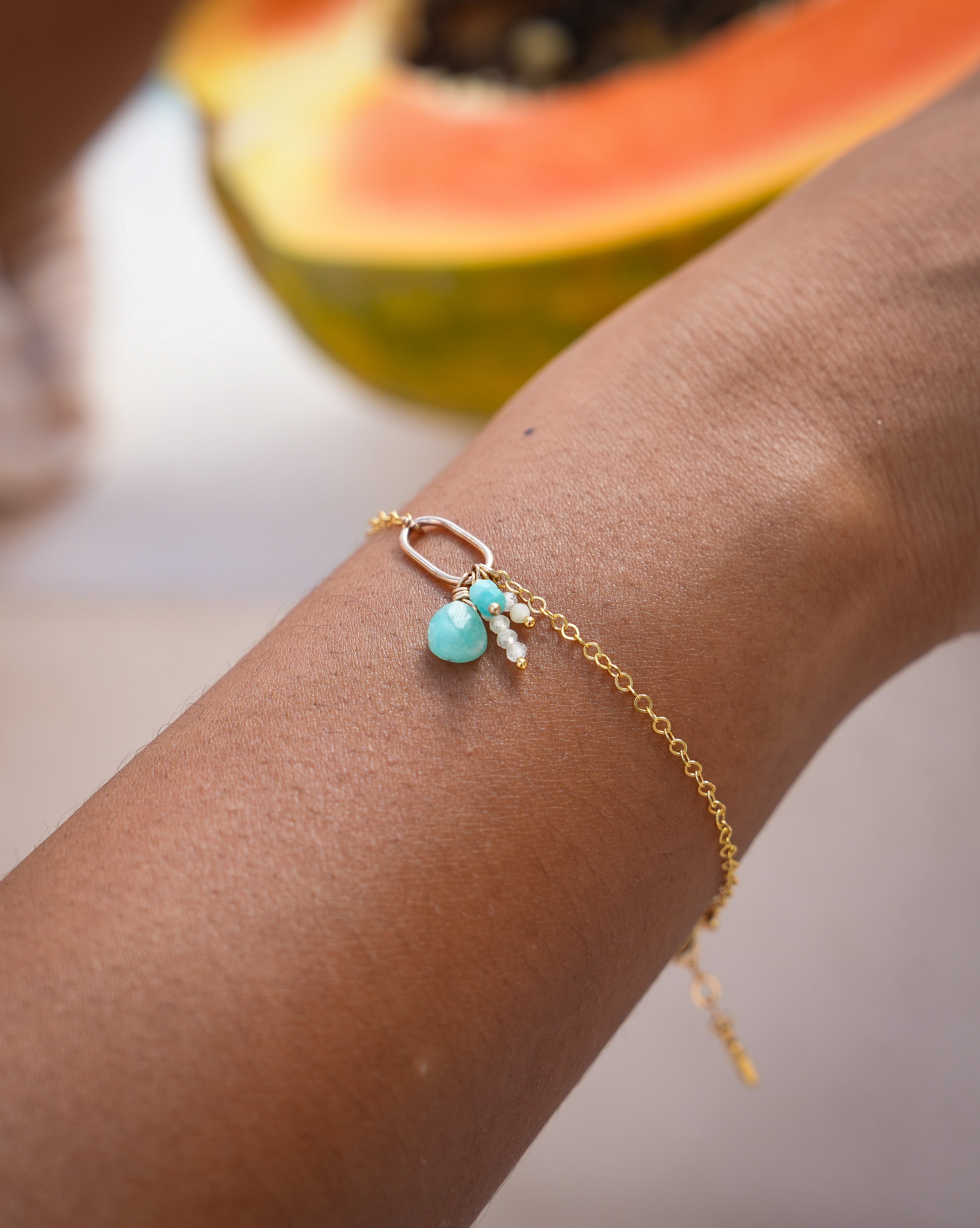 Model wearing baby blue gemstones perfect for summer vibes