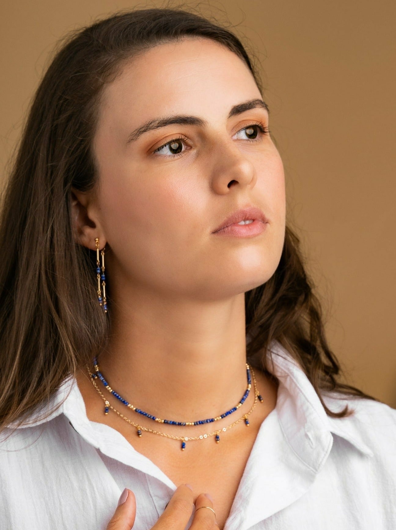 Model wearring Gemstone choker necklace in Lapis Lazuli 