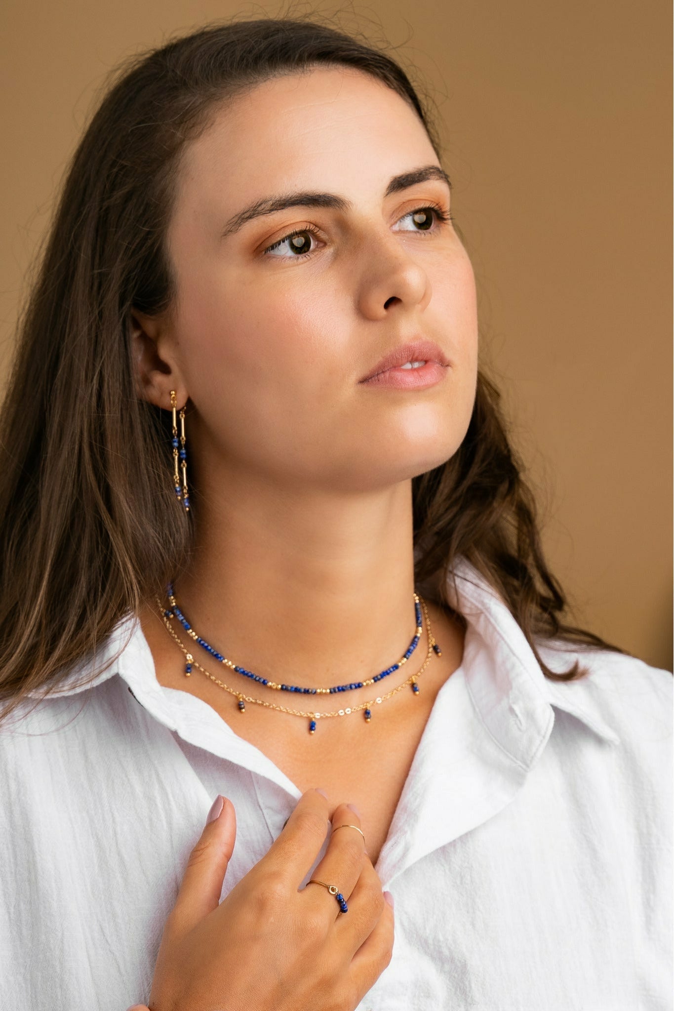 Model wearring Gemstone choker necklace in Lapis Lazuli 